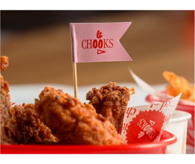 Tray of crispy fried chicken with a Chooks flag at Bonnie & Wild Food Hall, Edinburgh